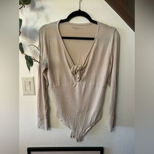 Abercrombie and Fitch Cozy Cream Body Suit with a twist tie